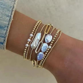 Three Large Pearls and Gold Beaded Bracelet